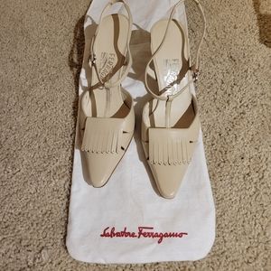 Salvatore Ferragamo nude heels.